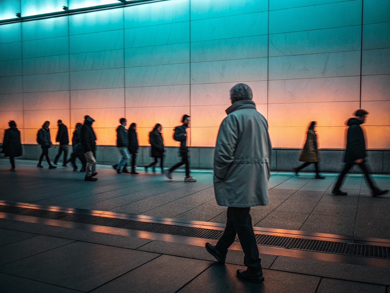 Documentary photograph of an ordinary looking pedestrian blending into an urban street setting